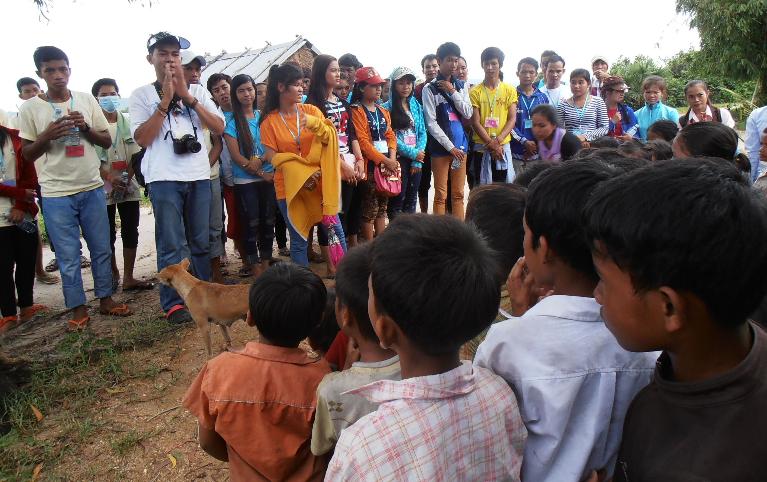 Prior to surveying the village families, our youth met with the village children