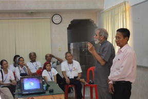 Director Fr. Charlie and Program Manager Rithy explaining DDP