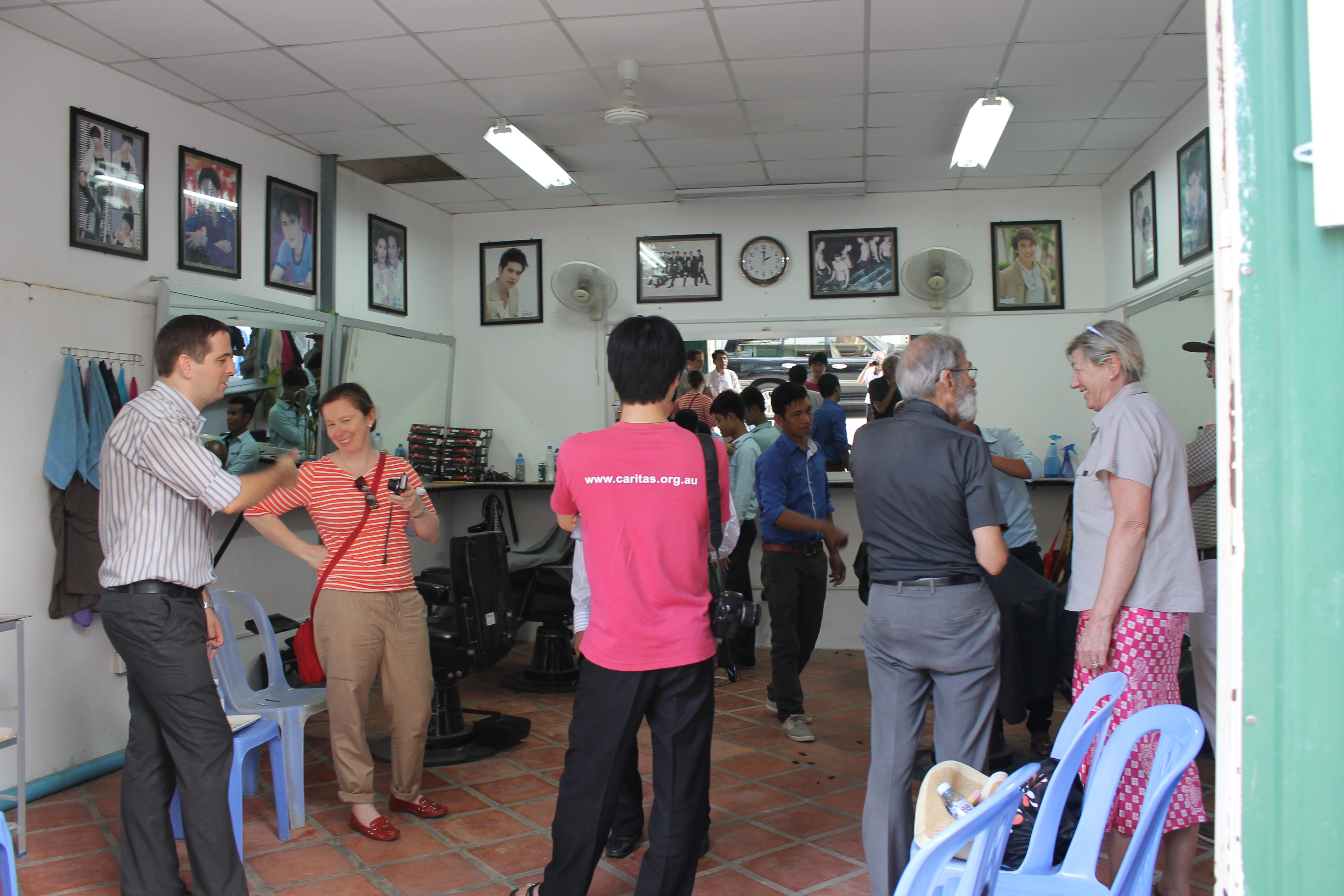 Caritas Australia visitors Checking out the Barber Shop