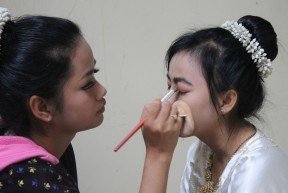 Deaf community members prepare to perform a traditional Khmer dance.