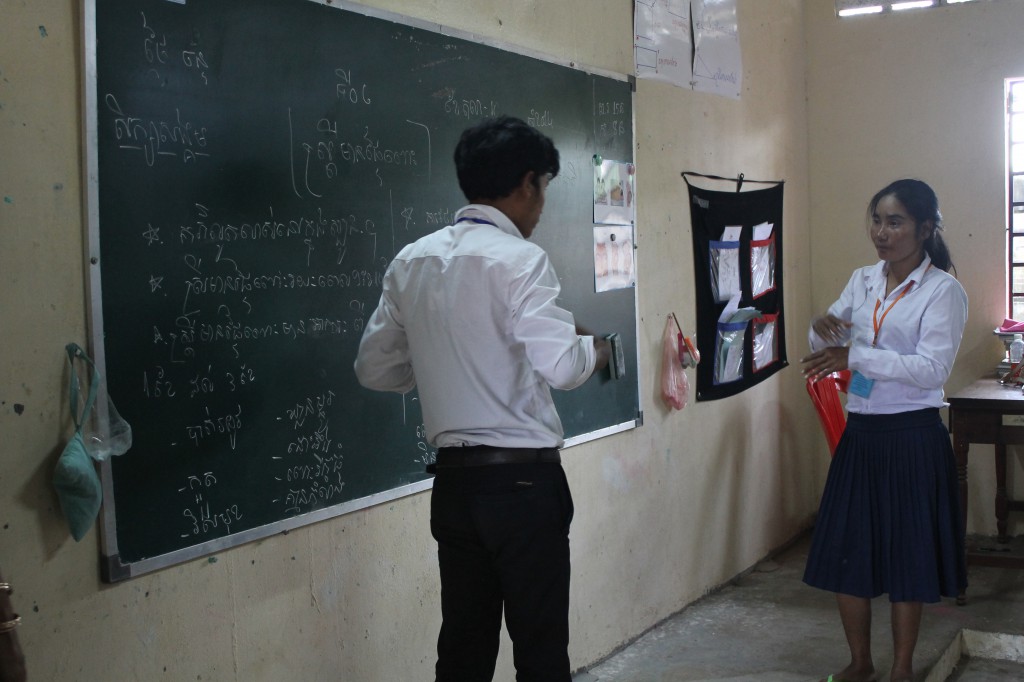Year two students reading off the board for the class