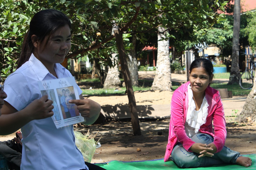 Soon, the lesson begins.  Field workers show the deaf students images on a card and then demonstrate the sign for that picture.  Today's theme was family.