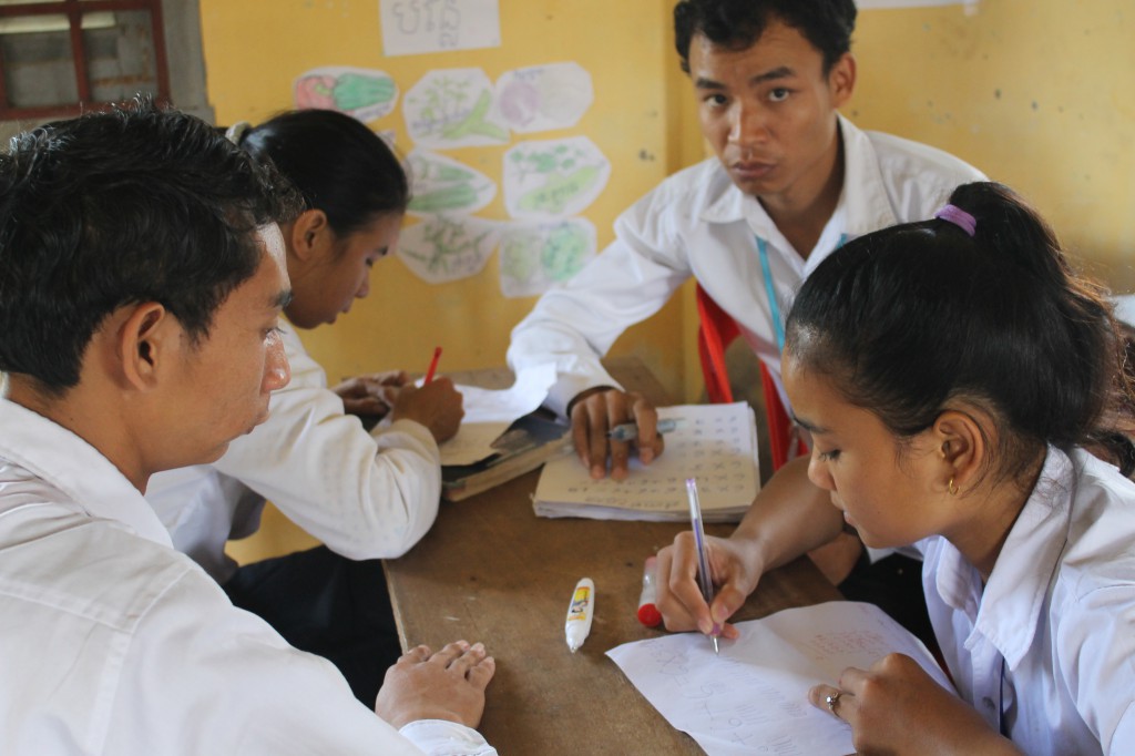 Year one students working in small groups on the six multiplication table