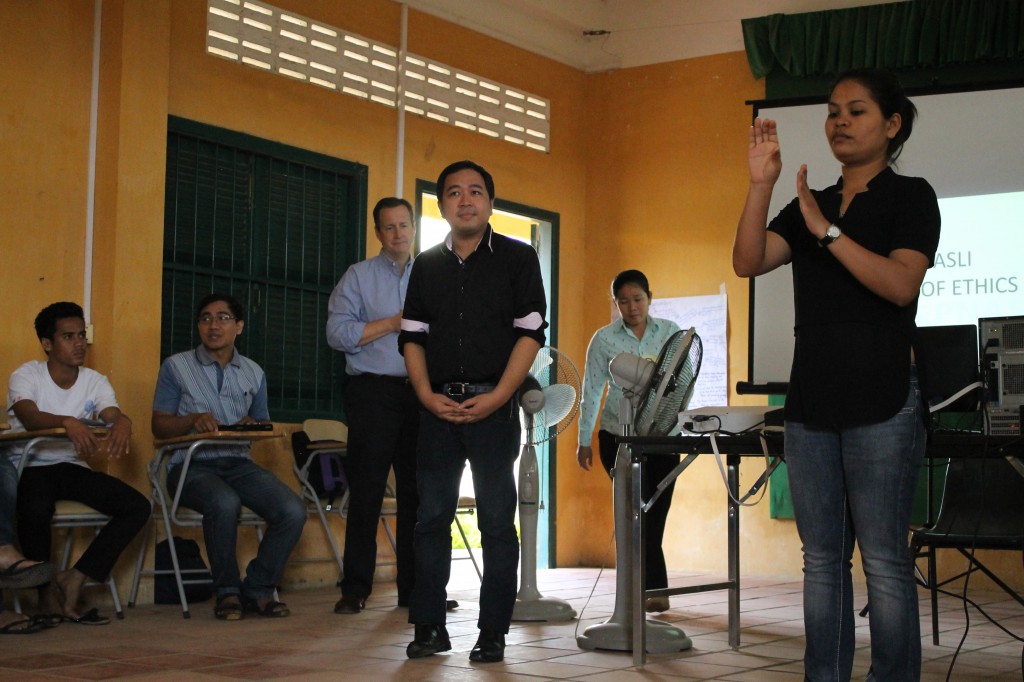 John, a Filipino Interpreter, discussing the Code of Conduct for Filipino interpreters